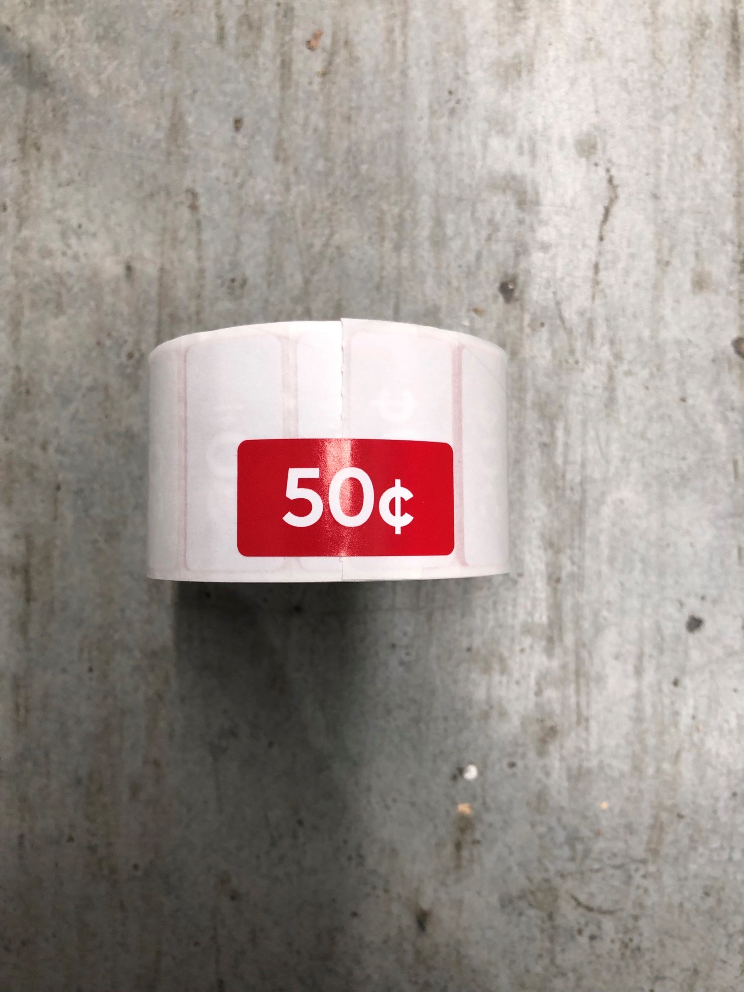ROLL $0.50 - RED REDUCTION STICKER